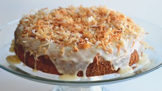 Coconut Rum Cake is a rich yellow cake, bathed in a rum & coconut cream, and topped with rum-coconut glaze and toasted coconut. Get this insanely good recipe from Cosmopolitan Cornbread