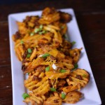Nacho Waffle Fries with scrumptious Chorizo and melted cheese, they're sure to be the winner at your football parties. | Cosmopolitan Cornbread