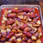 Cajun Taters & Sausage - an easy sheet pan supper from Cosmopolitan Cornbread. Perfect for your Football Festivities!