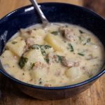 Creamy Italian Style Potato Soup - This soup is really creamy and fully of flavor with Italian sausage and spinach. You'll love this twist on classic potato soup.