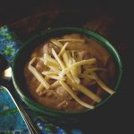 Easy Cheesy Potato & Sausage Soup - This soup is as easy to make as it is flavorful and filling! Creamy potato soup with smoked sausage and cheese. You can't get much better than that.