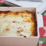 A delicious homemade lasagna with creamy béchamel and ricotta cheese inside. Traditional Lasagna is a comfort food classic.