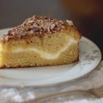 Sour Cream Coffee Cake with Cream Cheese Filling - Moist and decadent sour cream coffee cake with a tangy ribbon of cheese cream filling.
