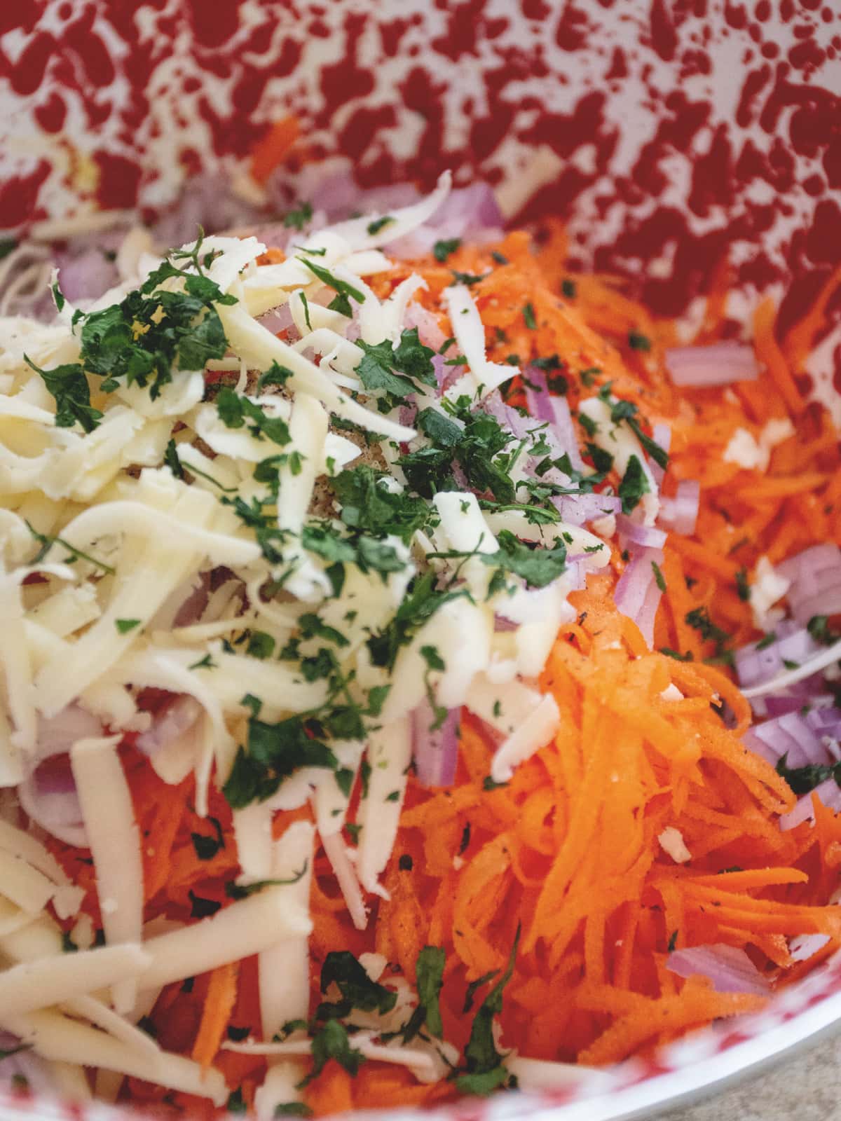 carrot fritter ingredients in mixing bowl