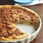 Turtle Bourbon Pecan Tart  with pecans, chocolate and a hint of bourbon. This dessert is decadent and delicious!