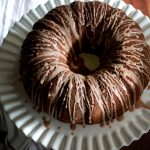 Deliciously Spiced Pumpkin Bundt Cake drizzled with a spiced glazed. Fall dreams are made of this. Get the recipe from Cosmopolitan Cornbread