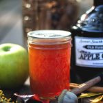 Caramel Apple Cider Jelly - A favorite fall season jelly made from apple cider, with a hint of caramel and cinnamon. Get the recipe from Cosmopolitan Cornbread