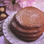 Delicious homemade Chocolate Pancakes. These make a tasty breakfast, or can even be served as a dessert! Get the recipe from Cosmopolitan Cornbread