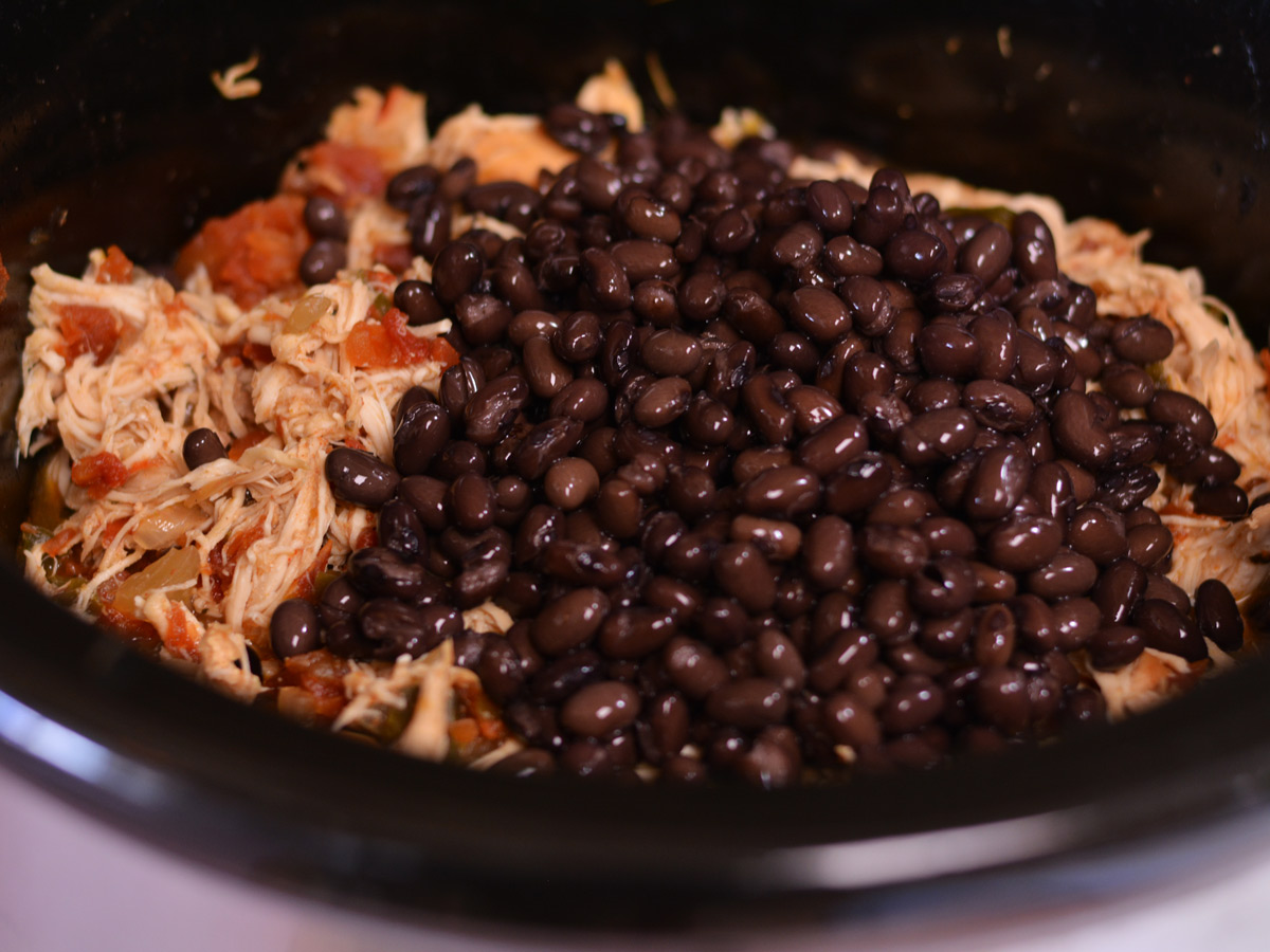black beans added to a slow cooker