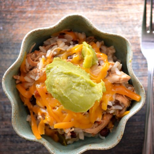 This easy slow cooker recipe combines tender chicken with fluffy rice, black beans, smoky ancho chili and other seasonings, and vibrant diced tomatoes for a comforting, flavorful meal. Perfect for a fuss-free, hearty dinner.