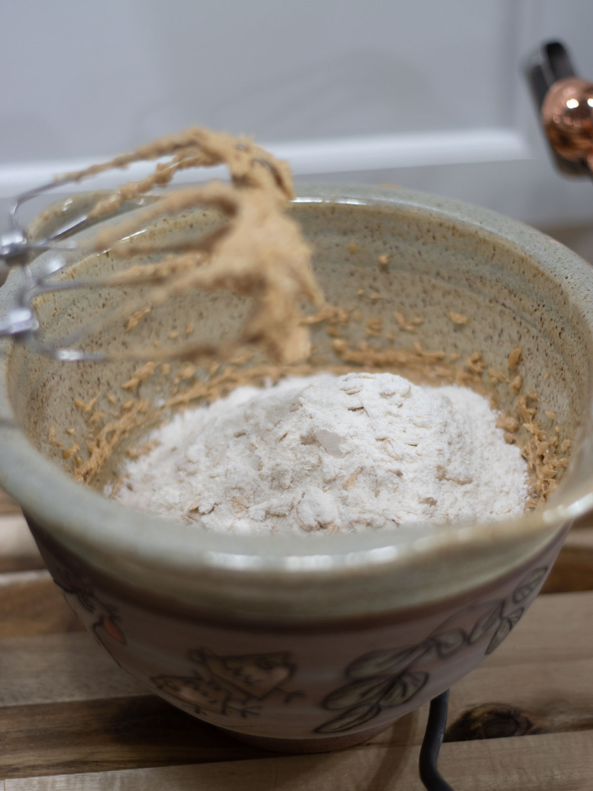 triple cookie bar ingredients in a pottery mixing bowl