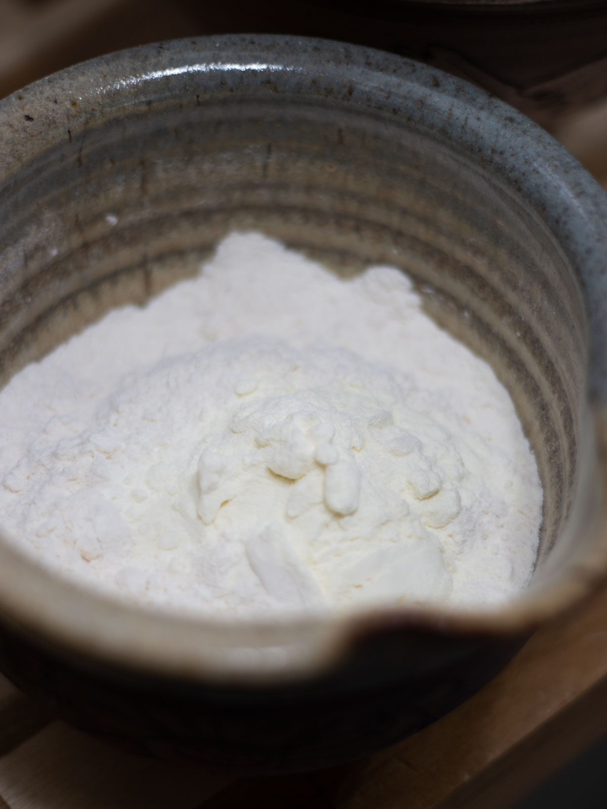 dry ingredients for buttermilk pound cake in a pottery bowl
