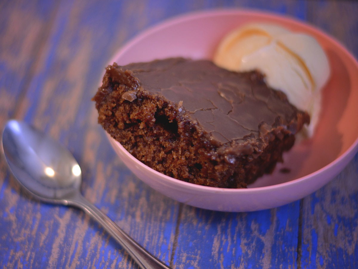 This Cracker Barrel Double Fudge Cola Cake copycat recipe recreates the restaurant's southern classic dessert at home. It has a rich, moist chocolate cake infused with a subtle cola flavor, topped with a decadent fudge frosting.