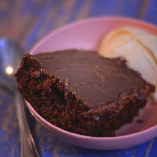 This Cracker Barrel Double Fudge Cola Cake copycat recipe recreates the restaurant's southern classic dessert at home. It has a rich, moist chocolate cake infused with a subtle cola flavor, topped with a decadent fudge frosting.