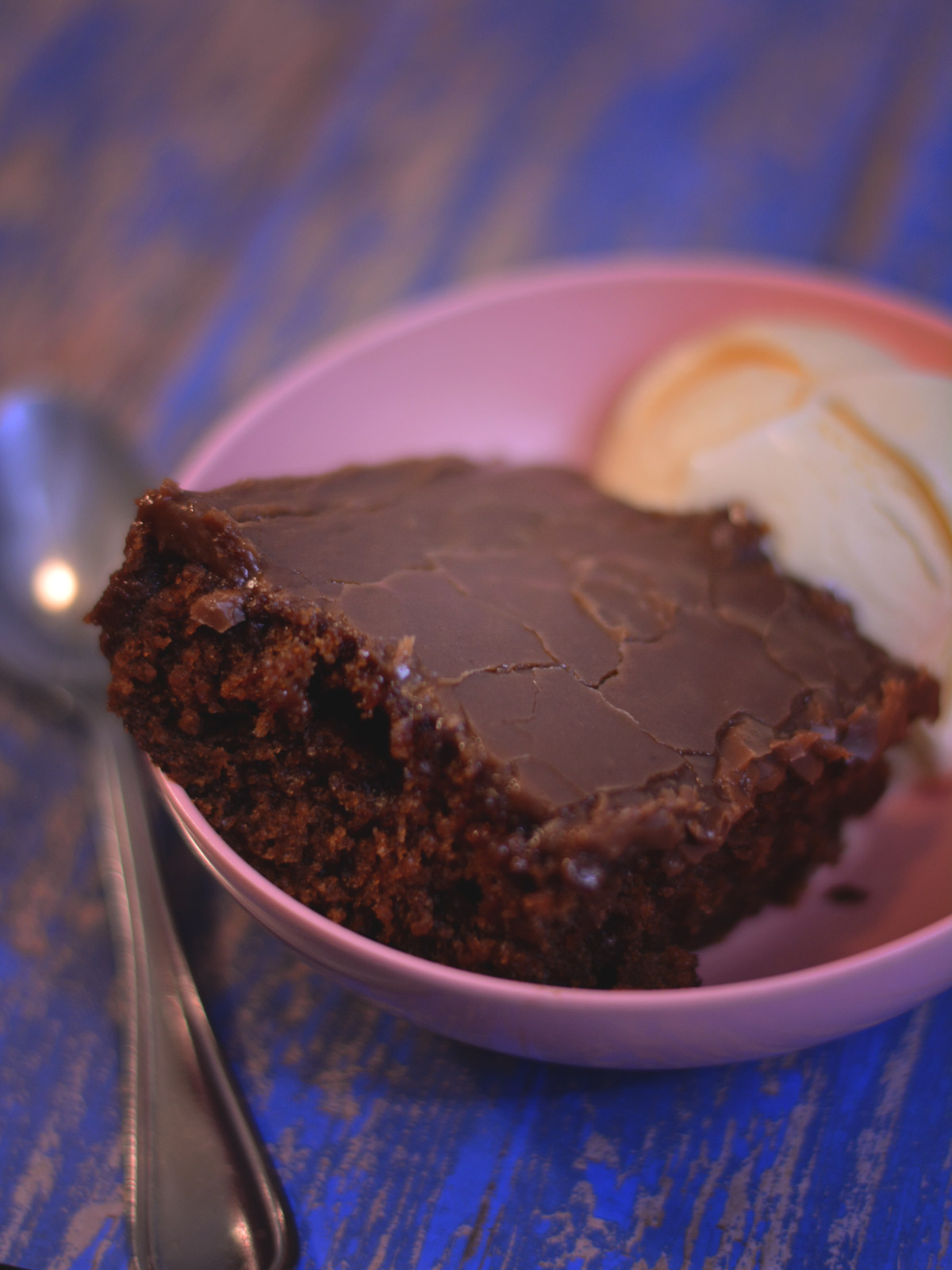 This Cracker Barrel Double Fudge Cola Cake copycat recipe recreates the restaurant's southern classic dessert at home. It has a rich, moist chocolate cake infused with a subtle cola flavor, topped with a decadent fudge frosting.