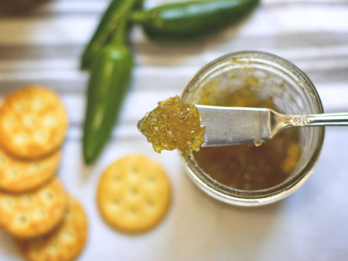 This homemade jalapeño jelly is the perfect balance of heat and sweetness — incredible over cream cheese with crackers, or brushed on grilled chicken for a spicy glaze! Learn how to make and can it right at home — it’s easier than you think!