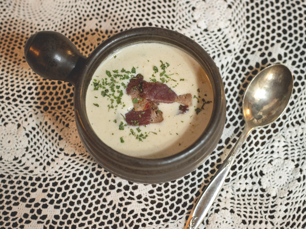 Cream of onion soup with slow-cooked onions, a touch of cream, and just enough seasoning to let good ingredients speak for themselves. It’s the kind of comfort that's quietly satisfying.