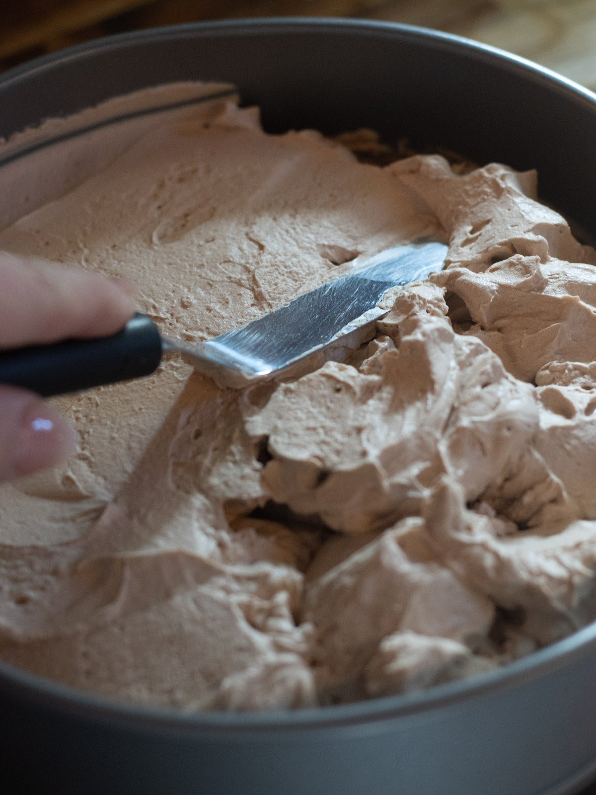 spreading the mocha cream filling