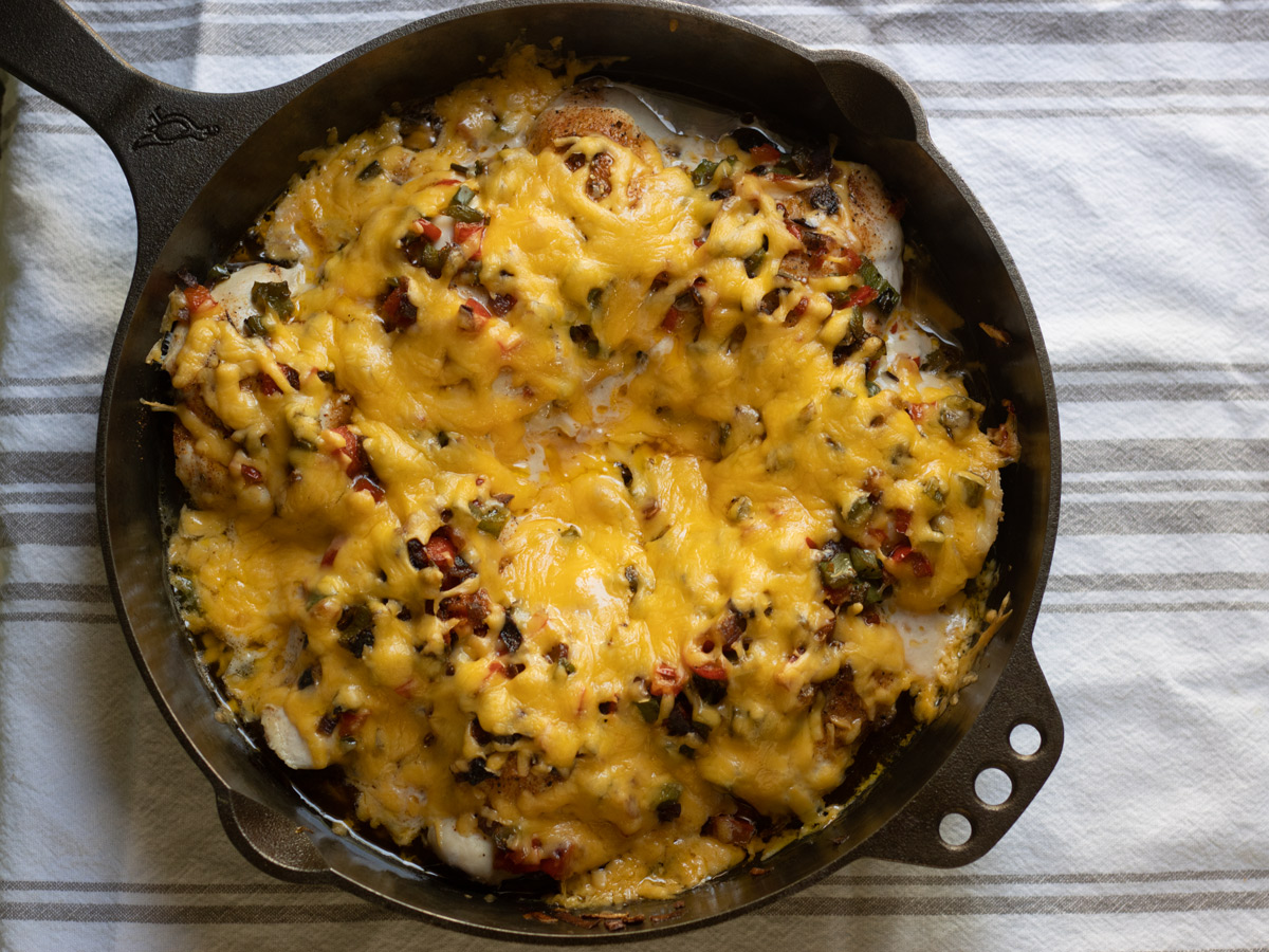 Cajun Stuffed Chicken is a bold, flavor-packed dinner that feels a little fancy without being fussy. Juicy chicken breasts are filled with sauteed peppers and onion with a Cajun kick, and smothered in bubbling, melty cheese.